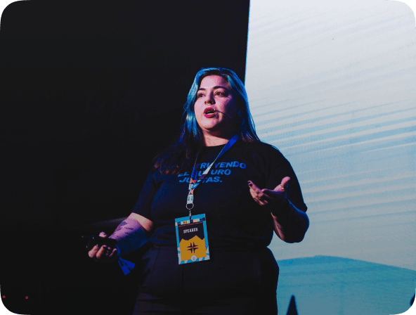 Nicki, on stage, presenting Swapr.